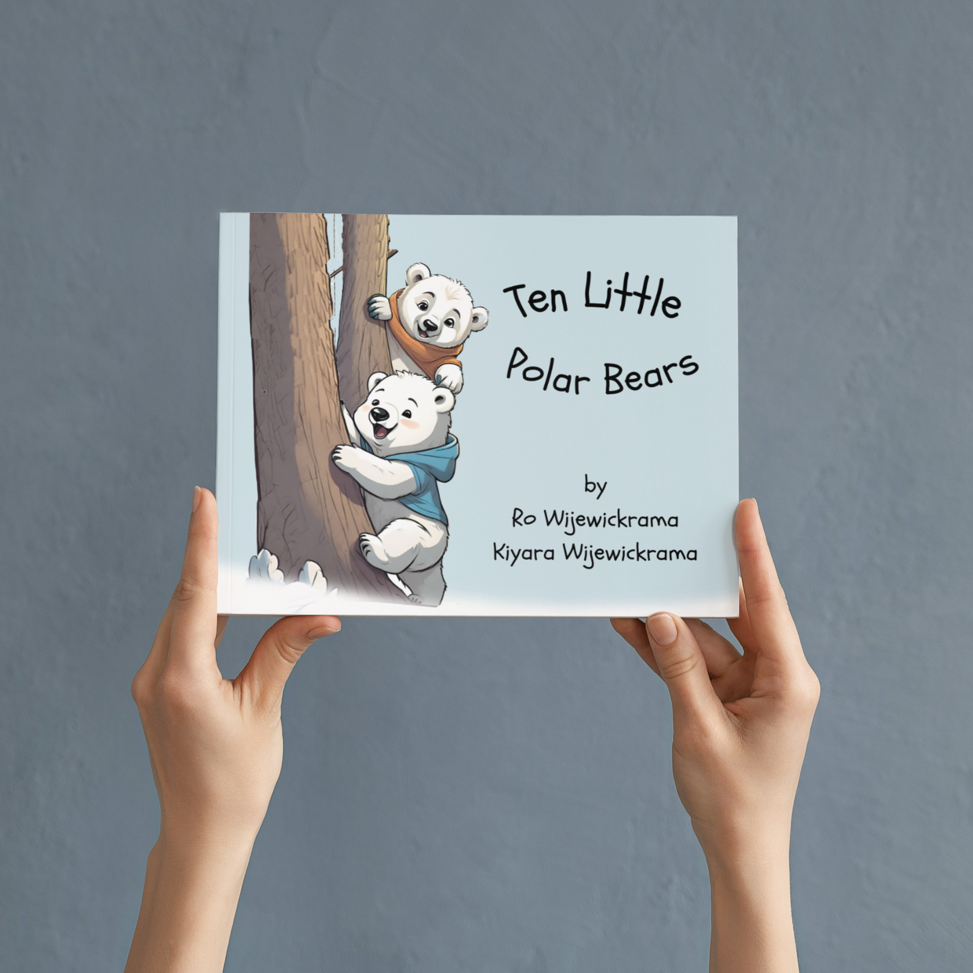 10 Little Polar Bears: Learn to count from one to ten holding the book